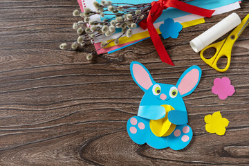 Wall Mural - Congratulation Easter bunny toy card with easter egg. Handmade. Project of childrens creativity, handicrafts, crafts for kids. Copy space.