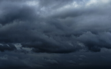 Wall Mural - beautiful dark dramatic sky with stormy clouds before the rain or snow