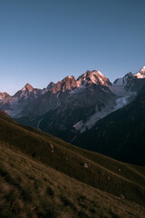 Wall Mural - Mountains of the Greater Caucasus Range at sunset. Elbrus region