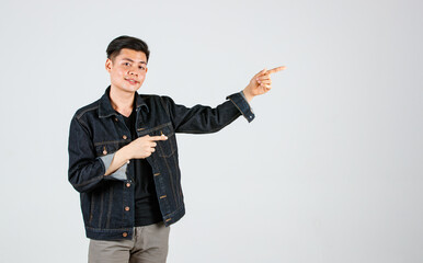 studio shot asian young handsome male hipster model wearing casual street denim jeans jacket standin