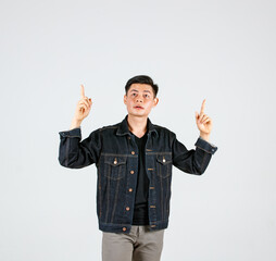 studio shot asian young handsome male hipster model wearing casual street denim jeans jacket standin