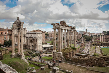 Wall Mural - View from the Capitol to the Imperial Forums, the ruins of the Basilica of Julius and the temple of Saturn and the arch of Septimius Severus. Rome, Italy