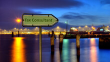 Street Sign To TAX CONSULTANT