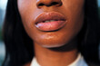 © Raul Mellado - full-lipped mouth of a young african woman