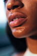 © Raul Mellado - detail of full-lipped mouth of an african woman