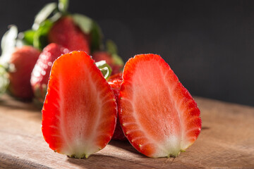 Wall Mural - prepared strawberries on the kitchen board, one batch in front