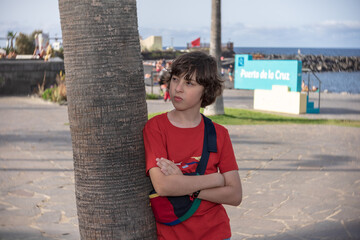 Portrait of a teenager on the promenade of Puerto de la Cruz. Tenerife. Canary Islands. Spain.