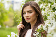 © millaf (Nemchinova) - Portrait of a happy young woman face with white flowers outdoor