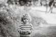 © Melissa Milis Photography/Stocksy - Black and White image of a girl outdoors