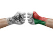 Two hands punch to each others on white background. Country flags painted fists, conflict crisis concept between afghanistan and madagascar