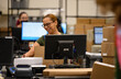 © Raymond Forbes LLC/Stocksy - Happy Employee at work