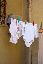 Colourful Clothespins Hanging Laundry