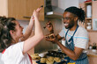 © Mattia/Stocksy - Couple of Influencers Cooking at Home