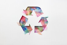 Recycle Symbol Made Of Colored Leaves