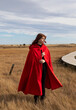 © Raymond Forbes LLC/Stocksy - Girl with elegant Red cape coat
