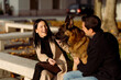 © Mauro Grigollo/Stocksy - Lovers and a dog having fun together