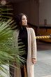 © Mauro Grigollo/Stocksy - Woman outdoor looks away