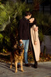 © Mauro Grigollo/Stocksy - Lovers with a dog