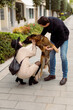 © Mauro Grigollo/Stocksy - Dog licks his owners in the face