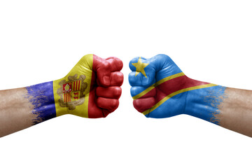 Two hands punch to each others on white background. Country flags painted fists, conflict crisis concept between andorra and dr congo