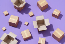 Lot Of Cardboard Boxes On Purple Background