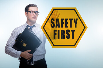 Wall Mural - Safety first concept with businessman