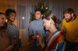 © Brat Co/Stocksy - Friends Celebrating New Year's Eve