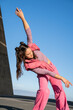 © Alba Vitta/Stocksy - Flexible woman dancing and posing outdoros