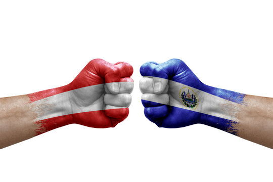 Two hands punch to each others on white background. Country flags painted fists, conflict crisis concept between austria and el salvador