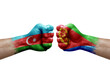 Two hands punch to each others on white background. Country flags painted fists, conflict crisis concept between azerbaijan and eritrea