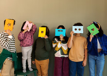 Children With Paper Masks