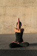 © Nuria Seguí/Stocksy - Woman Practicing Yoga Outdoor