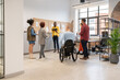 © Hernandez & Sorokina/Stocksy - Coworkers In Modern Office