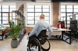 © Hernandez & Sorokina/Stocksy - Office Worker With Disability