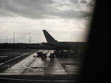 Airplane Window View  Of A Airport Tarmac