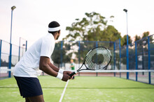 Anonymous Sportsman Playing Tennis