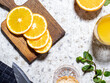 © Unnamed Agency/Stocksy - Orange cut on the marble countertop