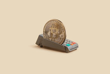POS Terminal With Bitcoin Over Pastel Background