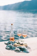 Rose Wine With Cheese And Nuts By The Sea