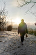 © Olga Kozicka/Stocksy - Dog Walking In Winter