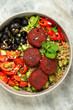 © Pixel Stories/Stocksy - Beet falafel Mediterranean vegan style bowl with quinoa