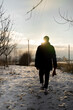 © Olga Kozicka/Stocksy - Walking Dog On Winter Day
