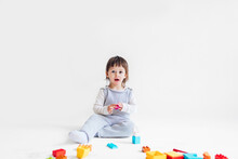Little Girl Playing With Cubes 