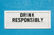 © Maryanne Gobble/Stocksy - Drink Responsibly Sign