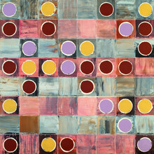A Painting;  Stamped And Colored Circles In A Grid.