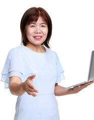 Studio closeup cutout isolated shot of Asian friendly senior grandmother female model in casual outfit standing smiling holding laptop computer typing surfing browsing internet on white background