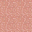 Doodle dots hand drawn, simple abstract seamless pattern in polka dot style. Smooth shapes in pastel palette on muted red background. Random spots design