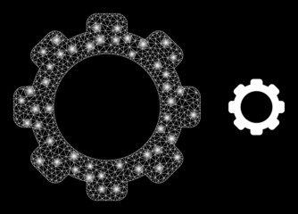 Wall Mural - Gearwheel icon and glare net mesh gearwheel model with sparkle spots. Illuminated model is done from gearwheel vector icon and triangle mesh. Sparkle carcass gearwheel, on a black background.