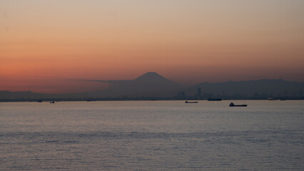 Wall Mural - Silhouette of Mt. Fuji seen from the Tokyo Bay Aqualine Umihotaru parking area