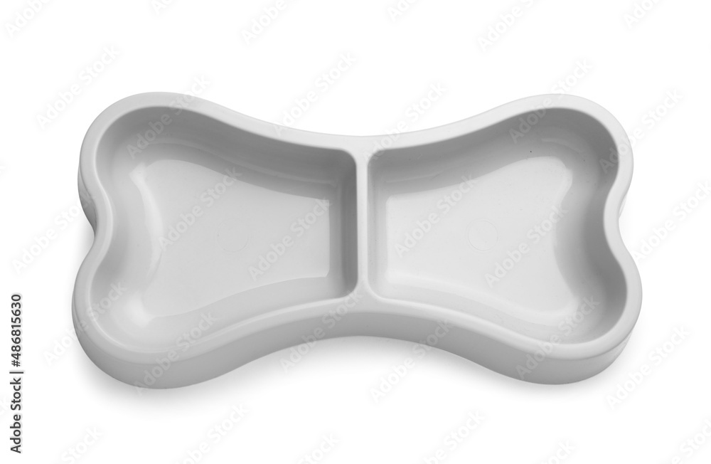 Bowl for pet in shape of bone on white background